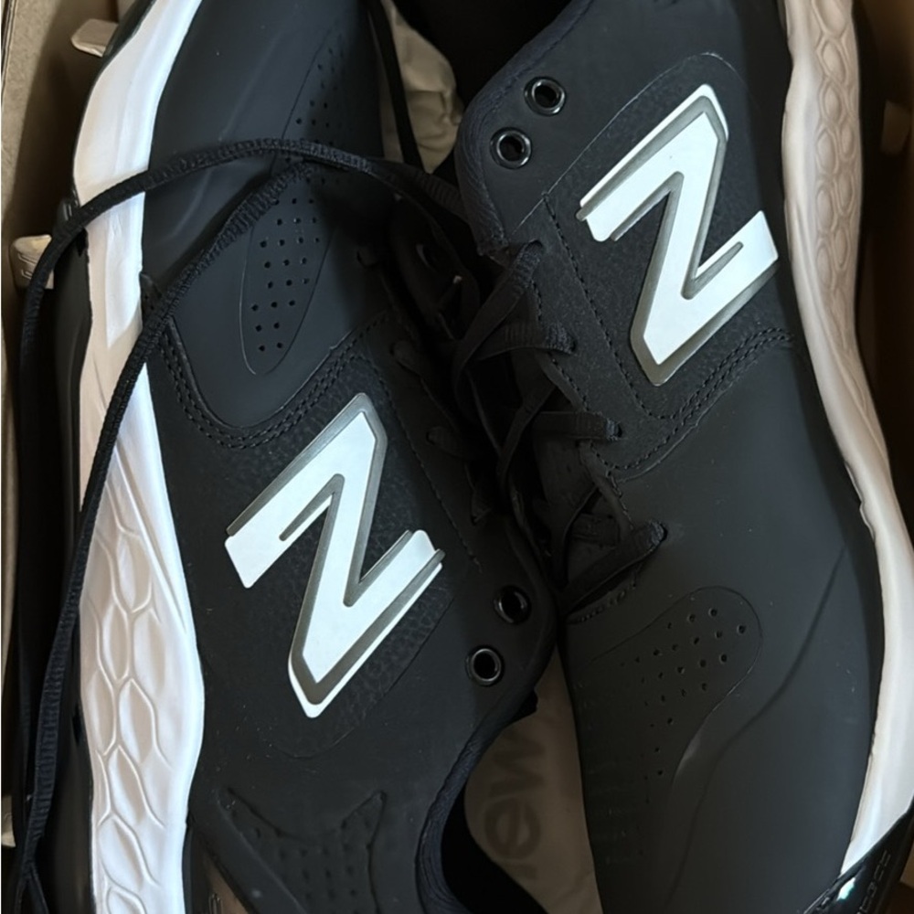 New Balance Black & White Athletic Cleats